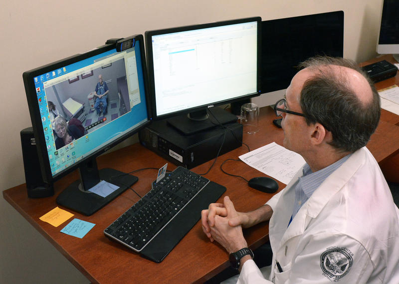 Doctor speaks with patient over a telehealth video 