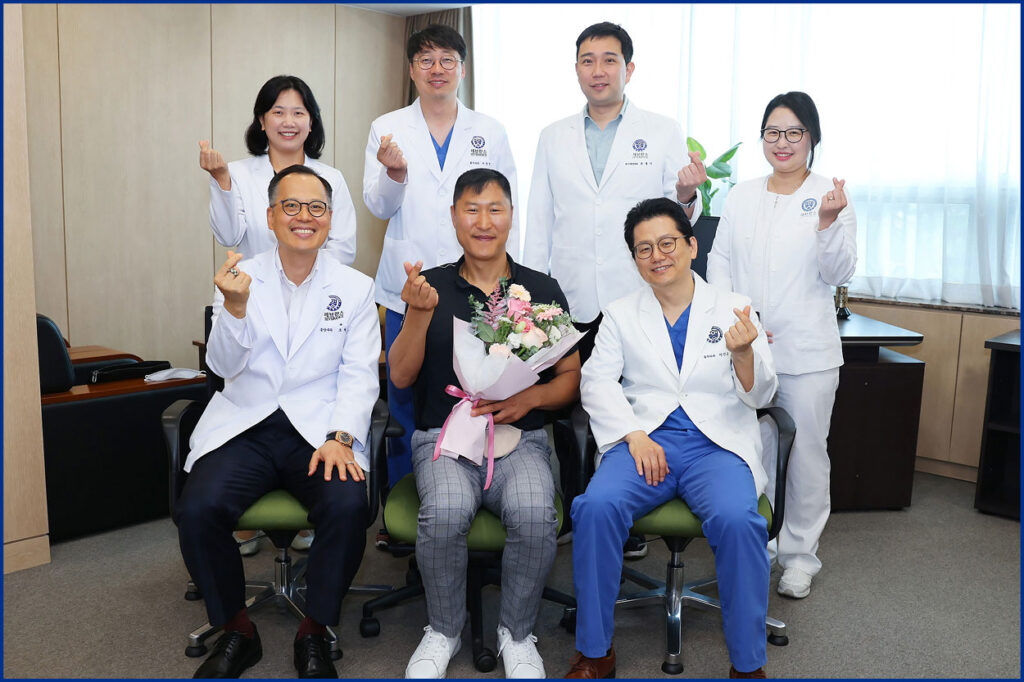 The winning Cancer Care Team representing Asia & Rest of World is from Yonsei Cancer Center at Yonsei University in Seoul, Republic of Korea. The team is seen here with Samjo Chung (front row, center), the patient that nominated them. 