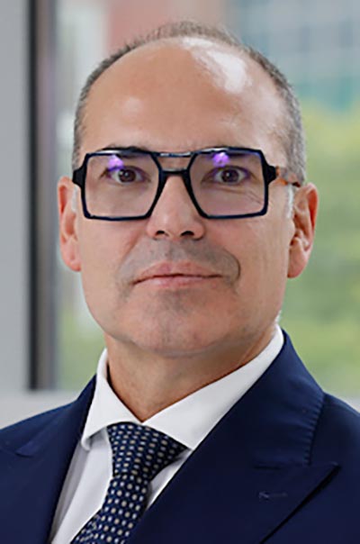 Christian Rolfo, MD, PhD, MBA, Dr.hc.